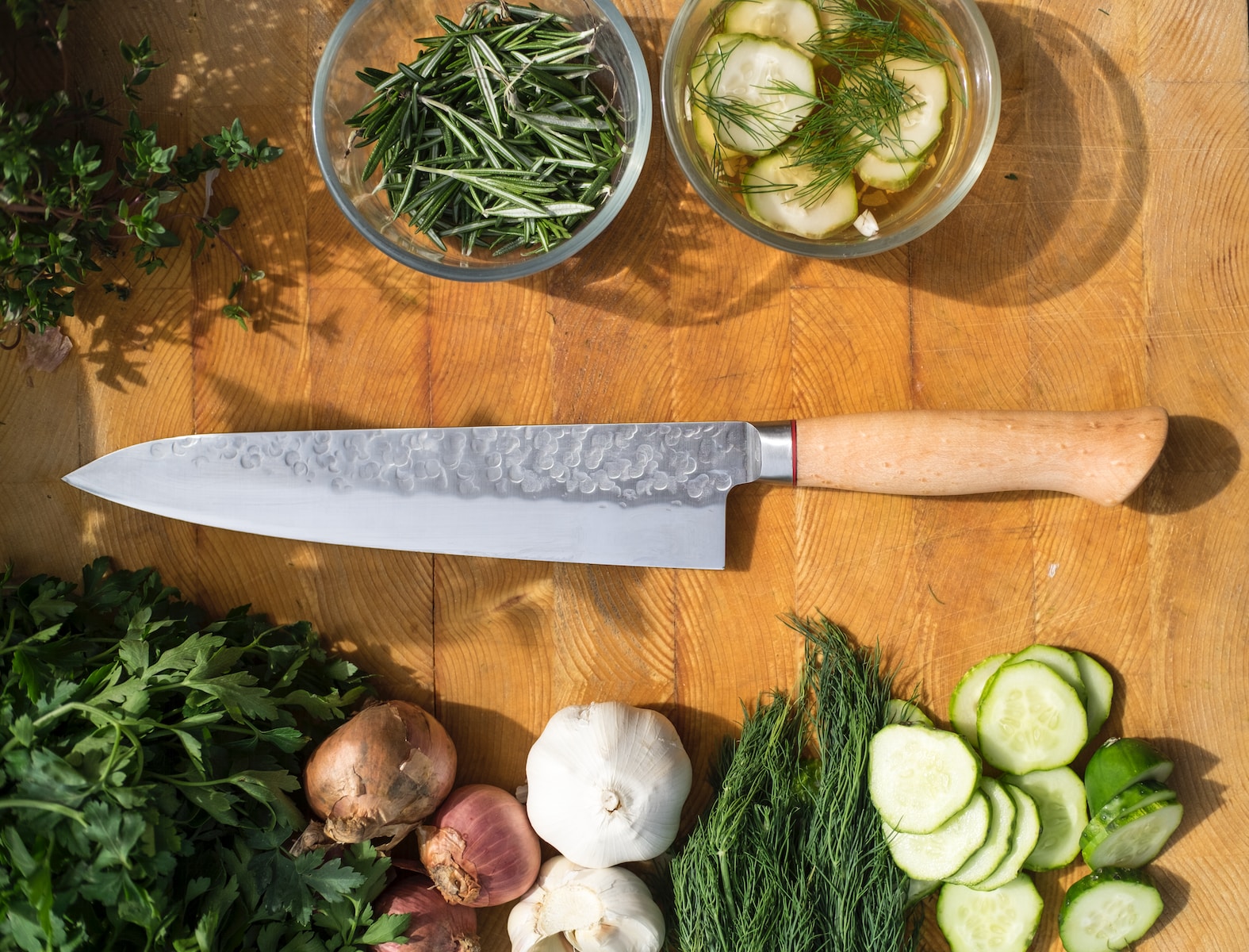 sliced vegetables and meat on chopping board