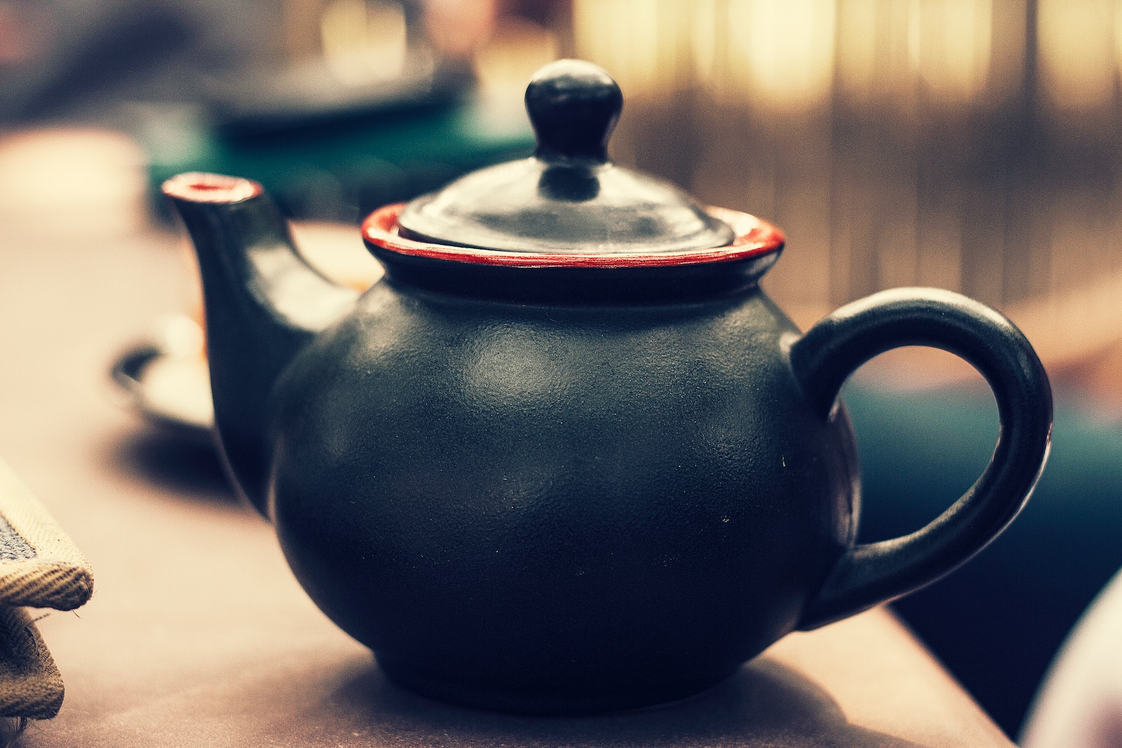 black and red ceramic kettle