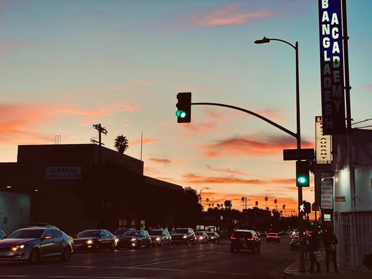 cars on road during sunset