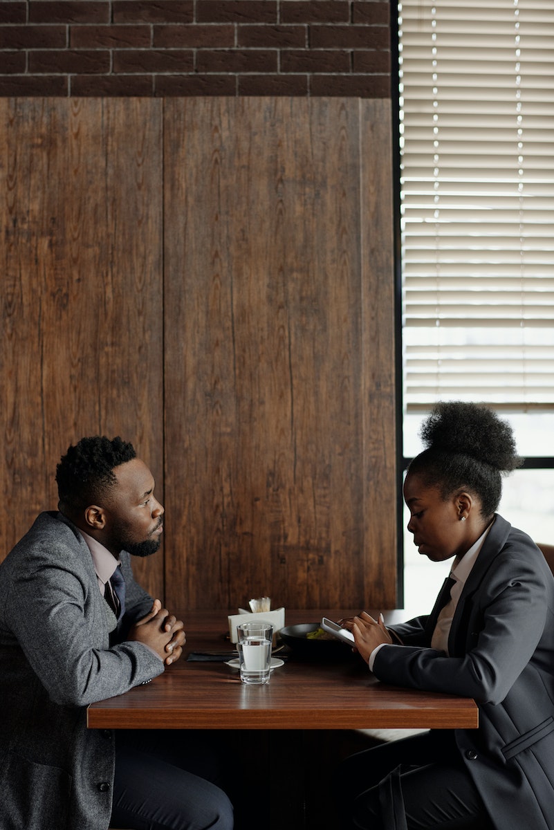 Coworkers Sitting at a Café