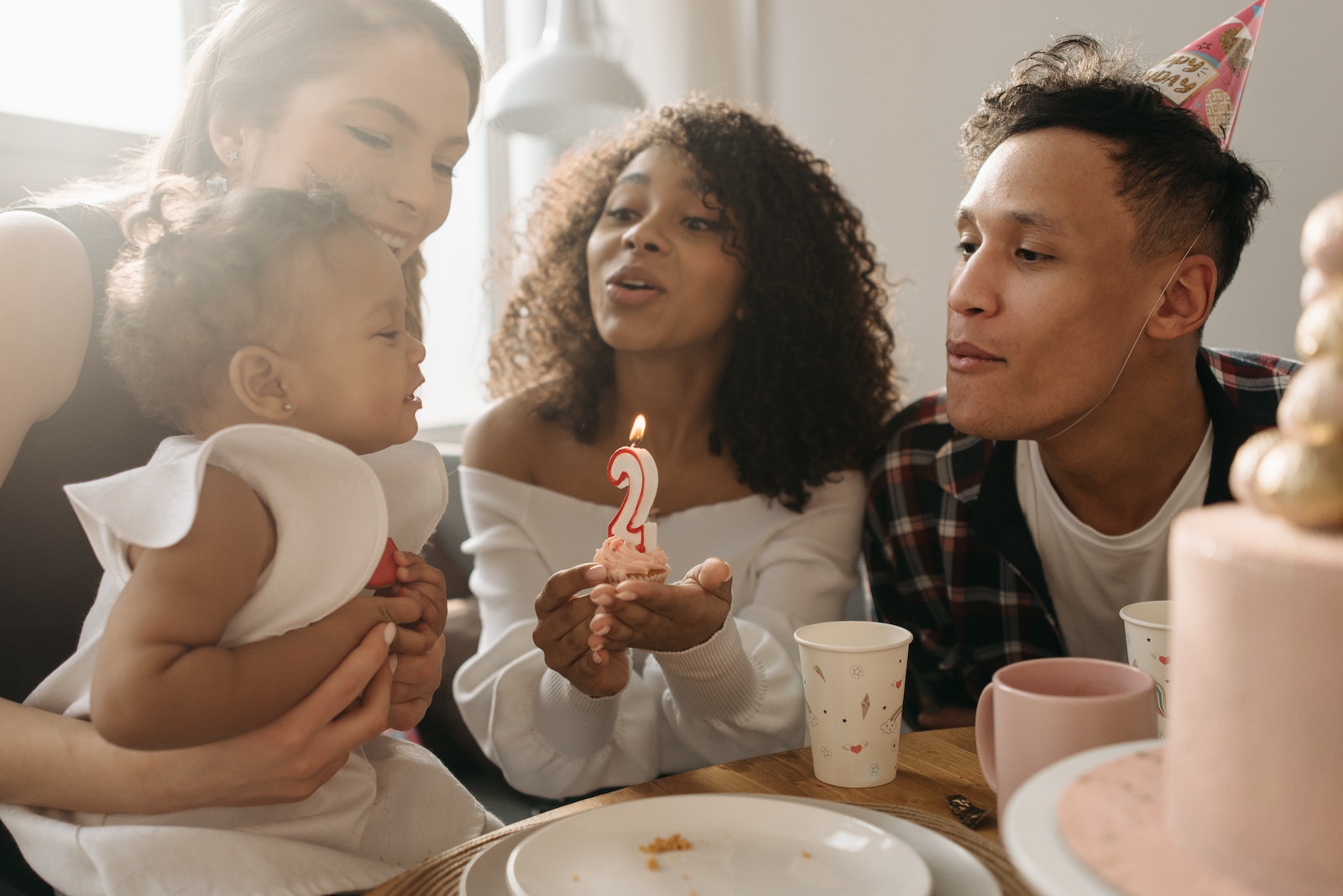 People Celebrating a Girl's Birthday