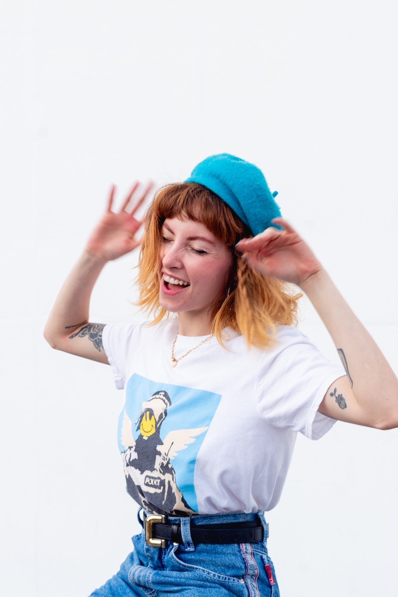 Women Wearing a Blue Hat Close-up Photography