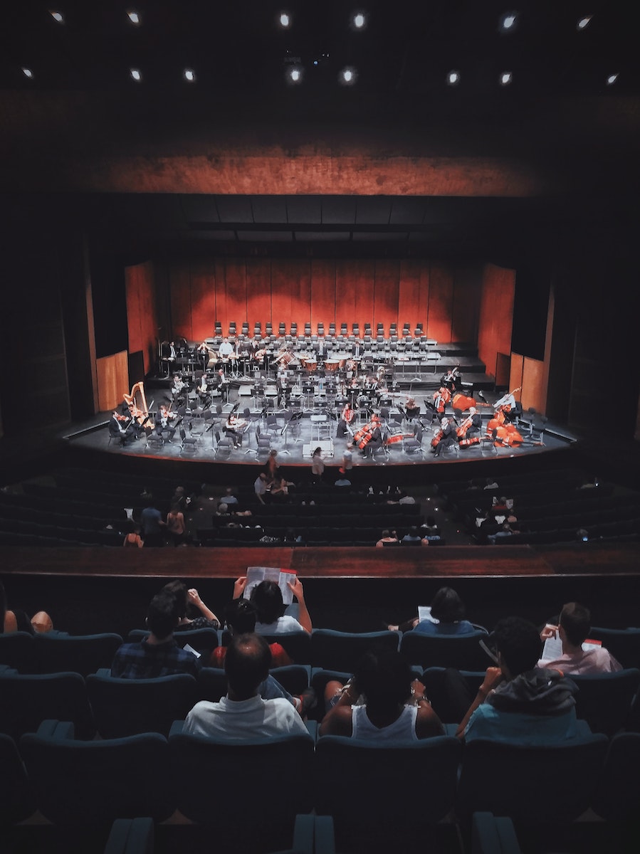 People Watching Play on Stage