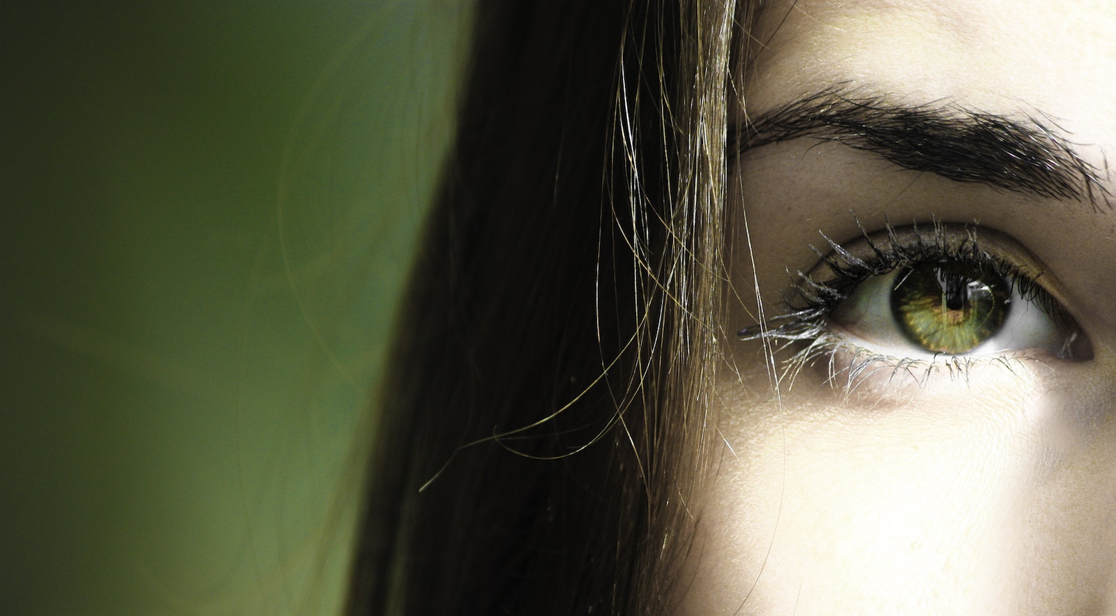 Selective Focus Half-face Closeup Photography of Female's Green Eyes