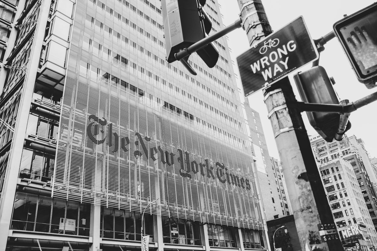grayscale photo of city buildings