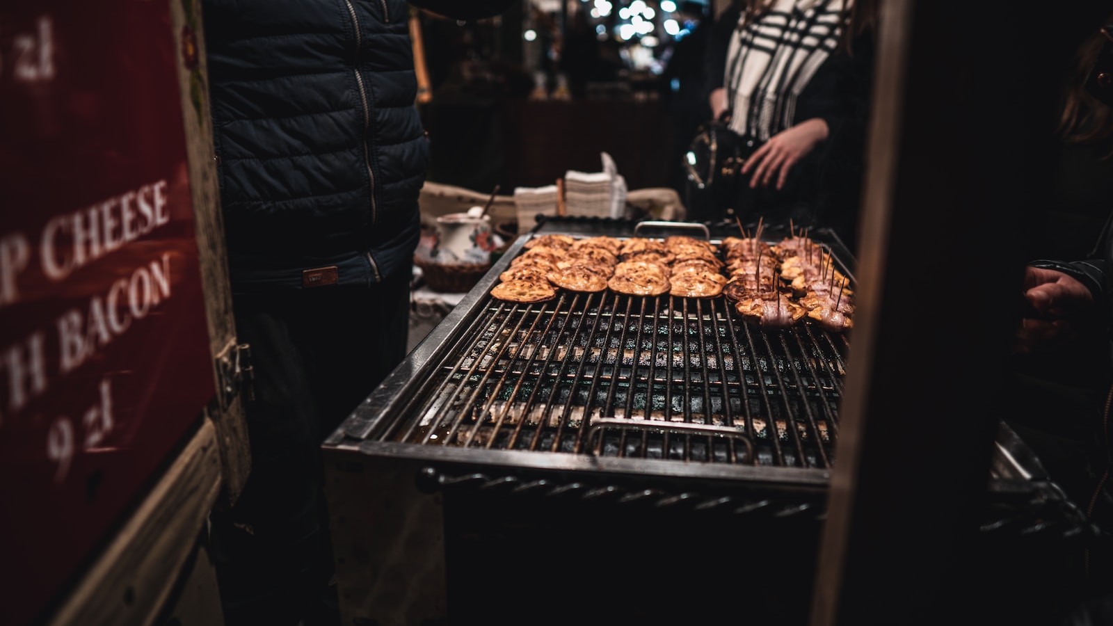 a bunch of food that is on a grill