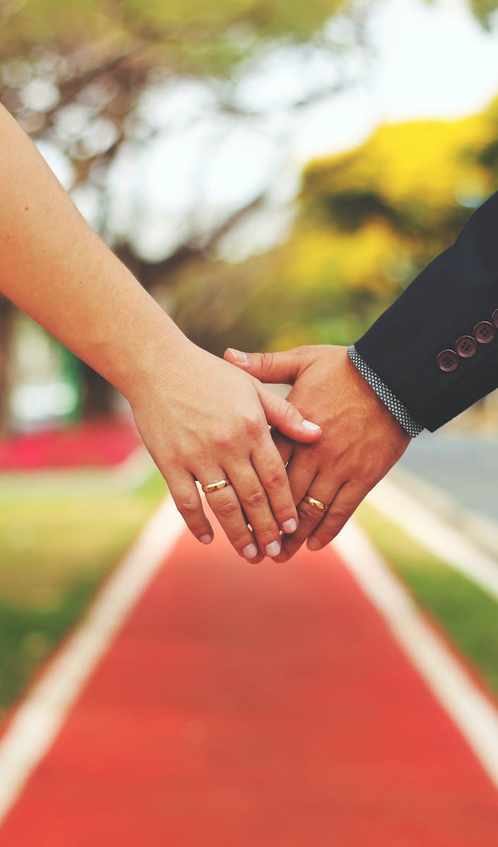 Bride and Groom Holding Hands