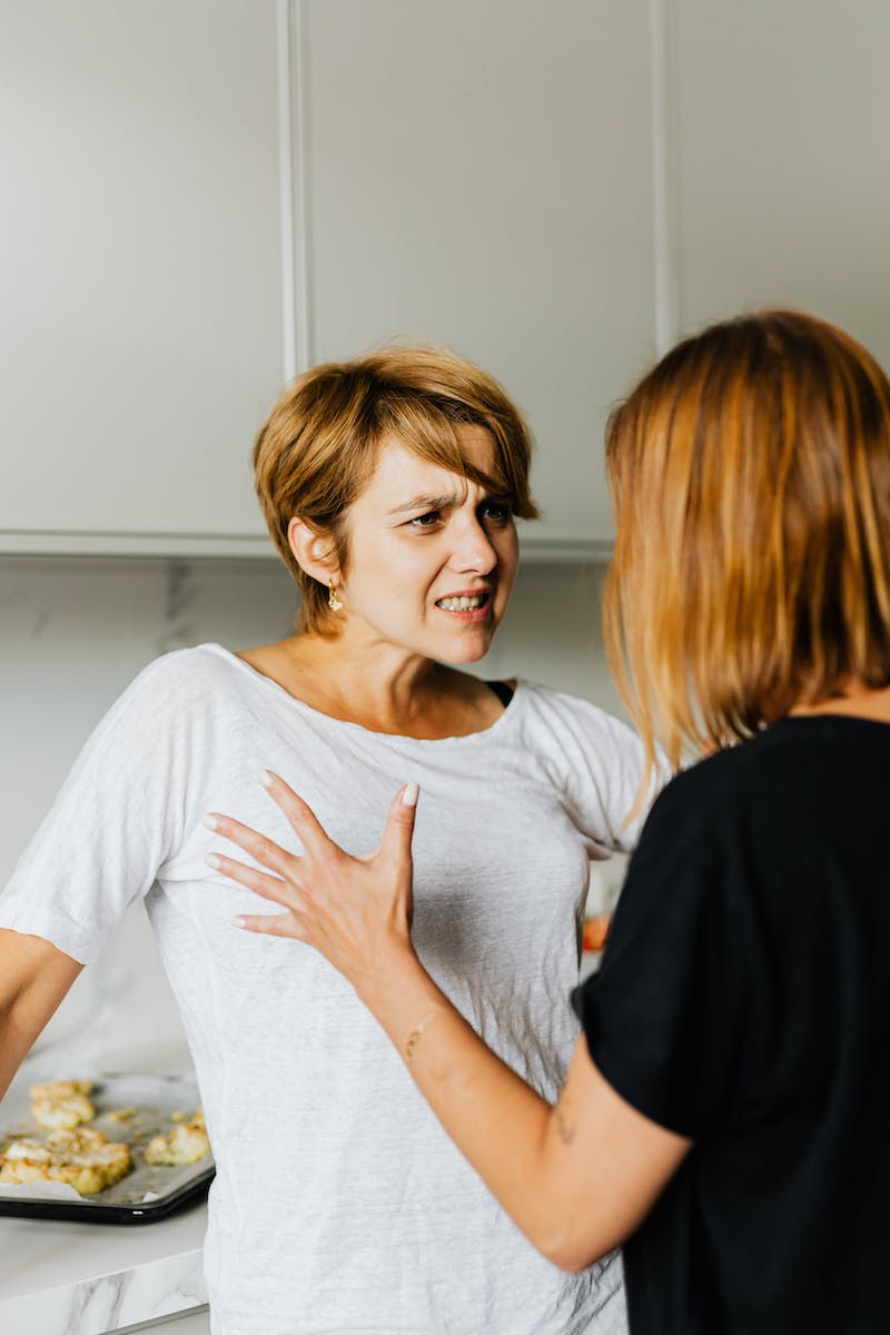 An Angry Woman in White Shirt
