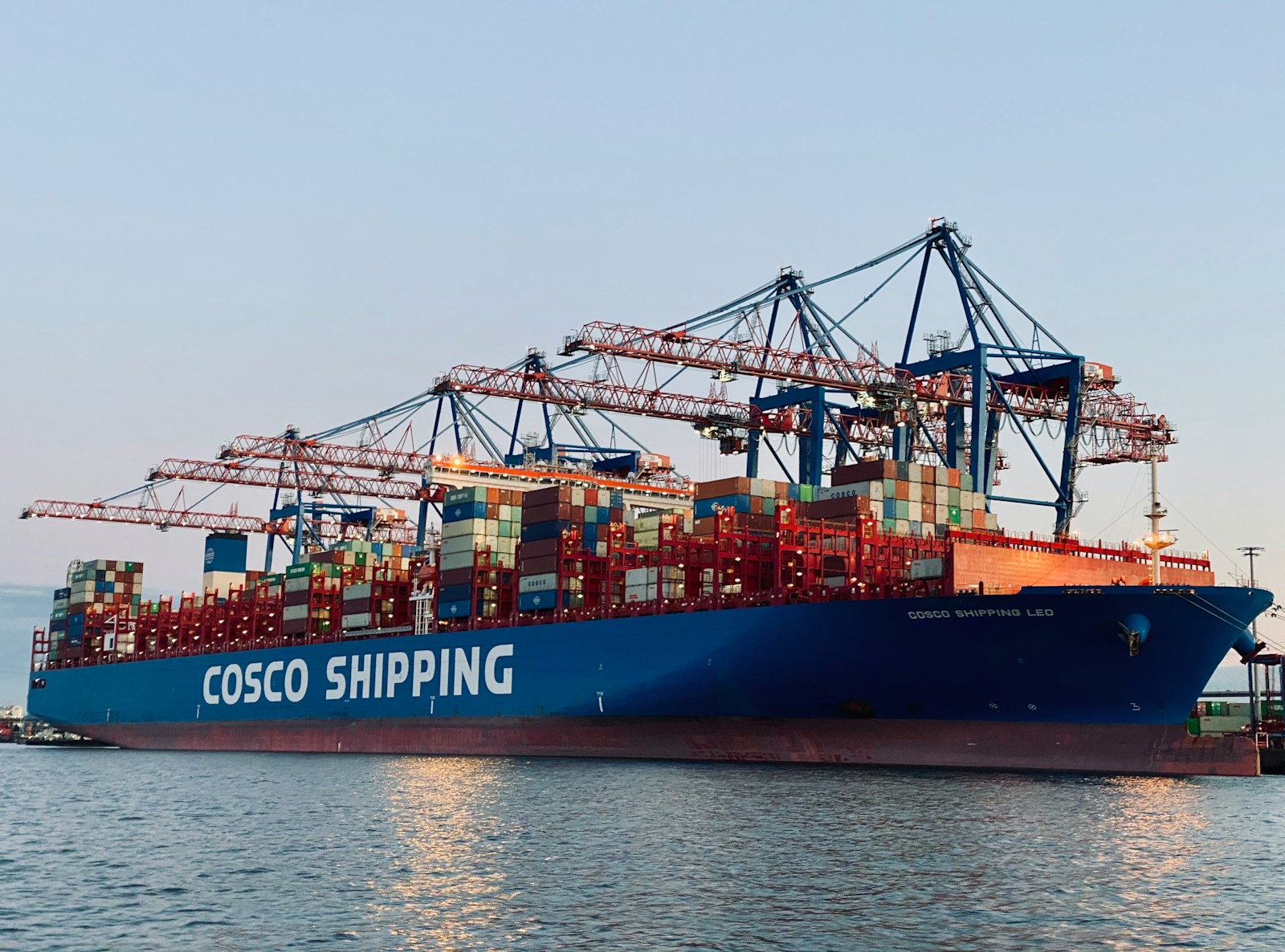 cargo ship on dock during daytime