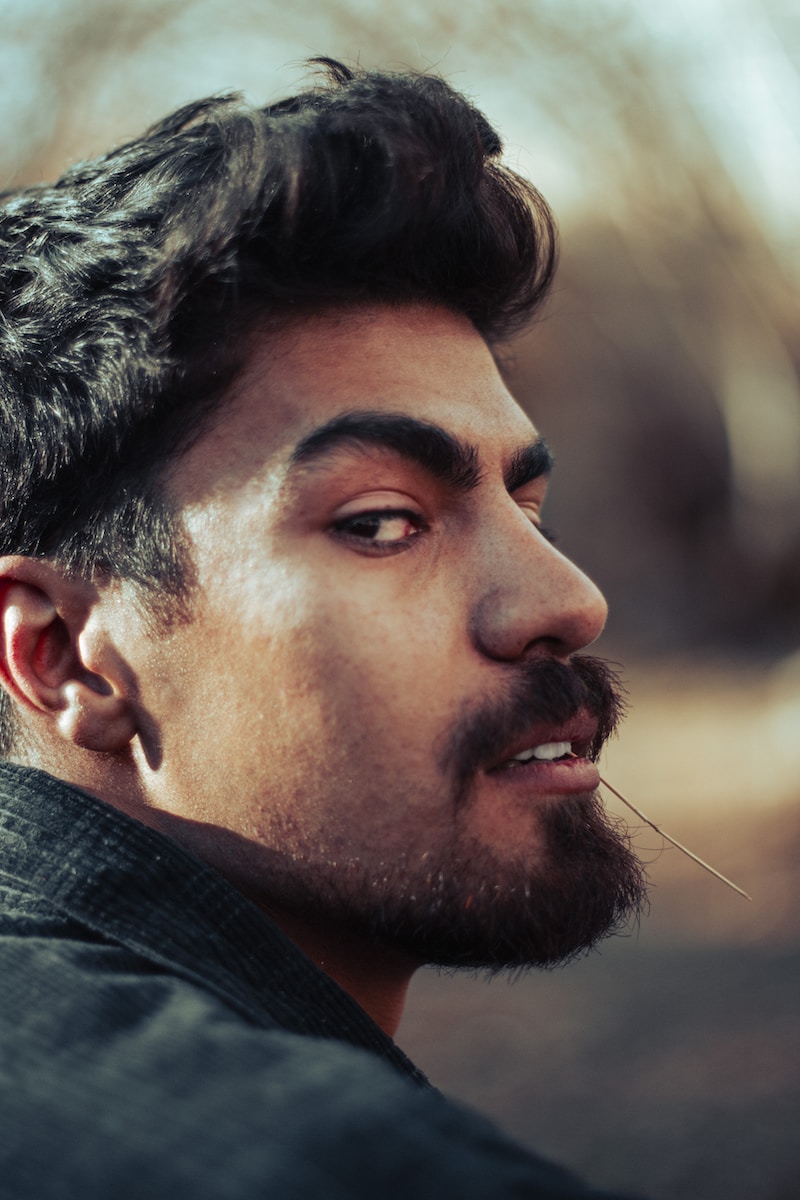 a close up of a man with a goatee