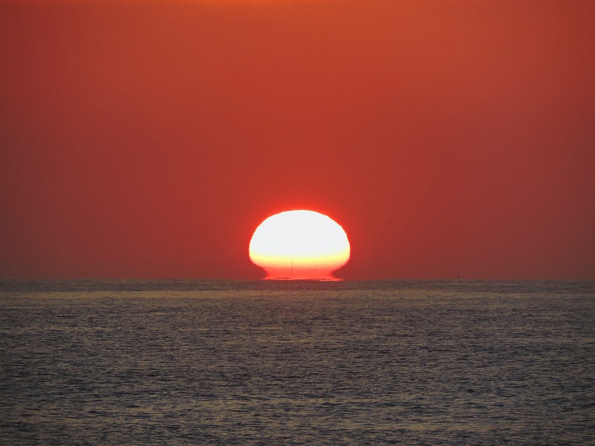 silhouette of mountain during sunset