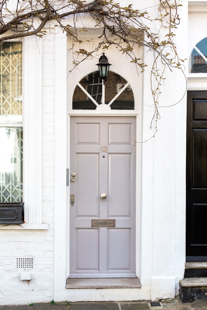 white wooden door mounted white wall