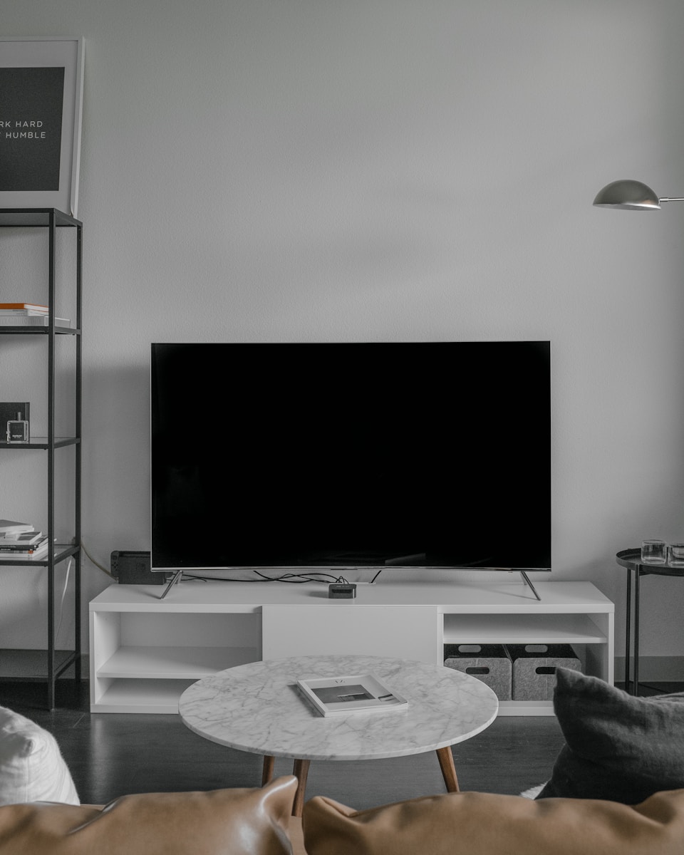 flat screen TV displaying black screen