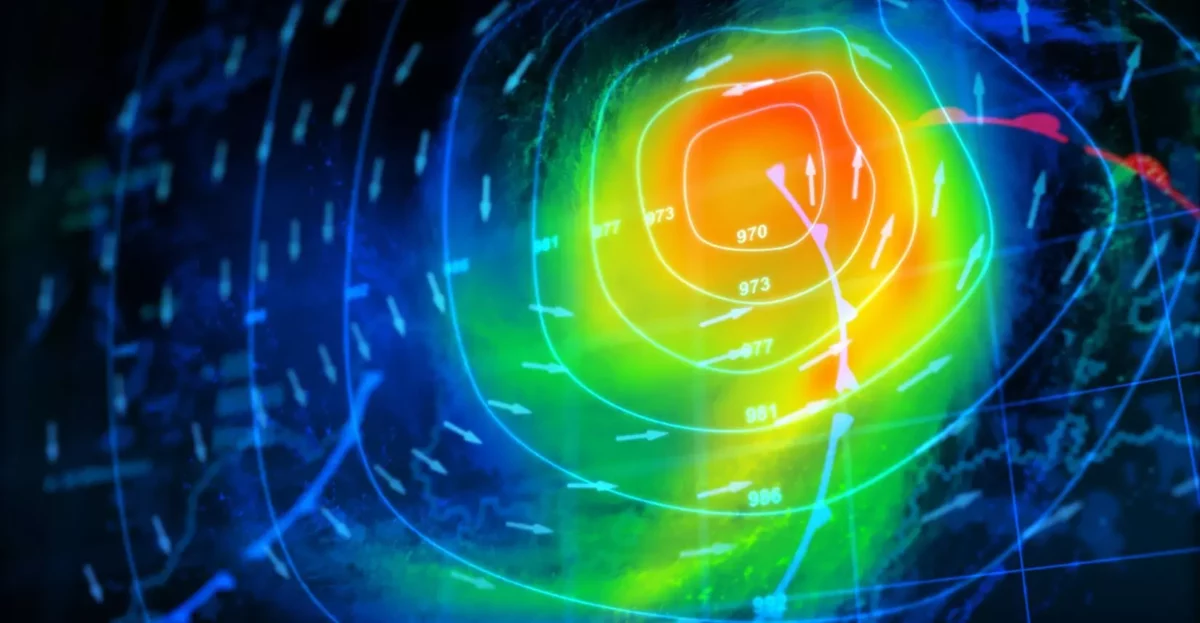 Farebná mapa tlakových systémov zobrazujúca cyklón s izobarami a prúdenie vzduchu v atmosfére.