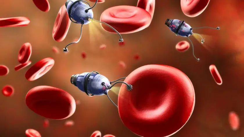 Nano roboty v krvnom obehu medzi červenými krvinkami. Futuristická medicínska technológia v akcii.