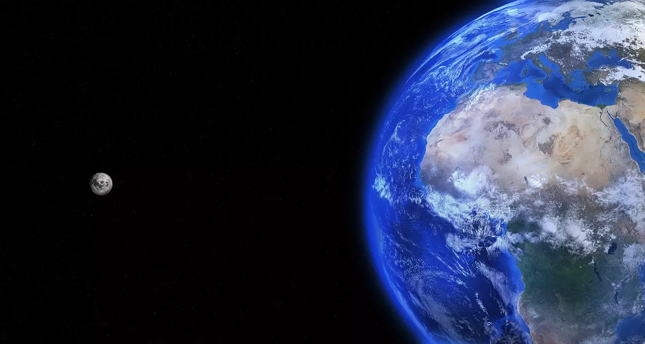 Zem a Mesiac vo vesmíre, pohľad na africký kontinent a oceány z vesmíru, tmavé pozadie s hviezdami.